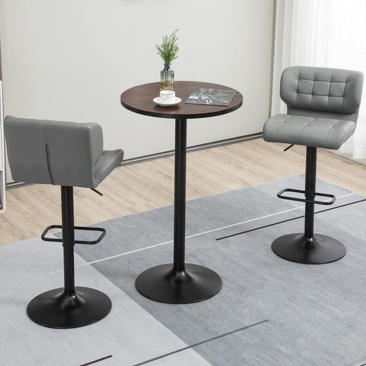 Round bar table with dark round wood top and black metal pedestal base.