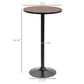 Round wood top bar table with tall black pedestal base, side view