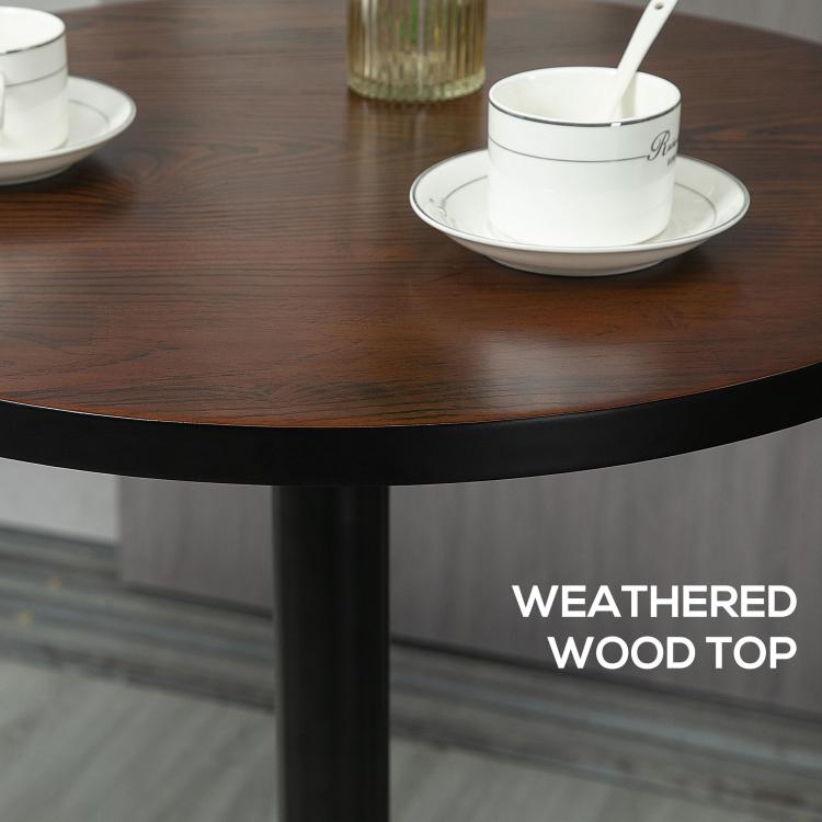 Close-up of round weathered wood tabletop edge on black metal pedestal