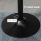 Matte black round tabletop base with central metal column, steel frame style