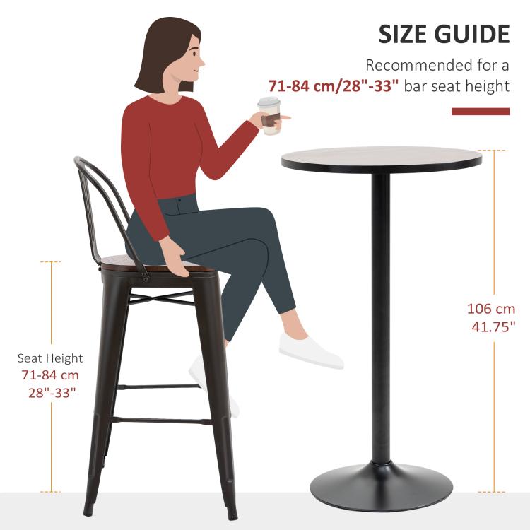 Round wood bar table with tall black pedestal and wide circular base