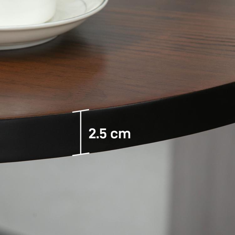 Underside view of round wood bar table showing black apron thickness