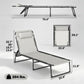 Folding chaise lounge pool chair with cream mesh panel seat and back, black metal stand