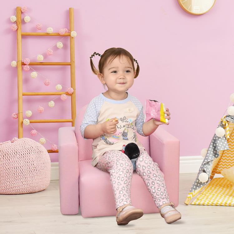 Pink kids armchair and side table set with rounded, padded foam-style cushions
