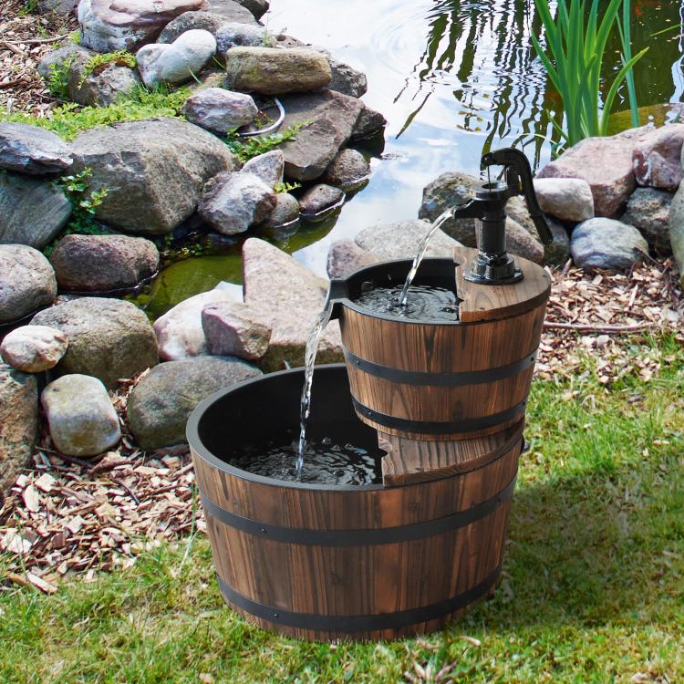 Freestanding two-tier wooden barrel fountain with flowing water and black pump