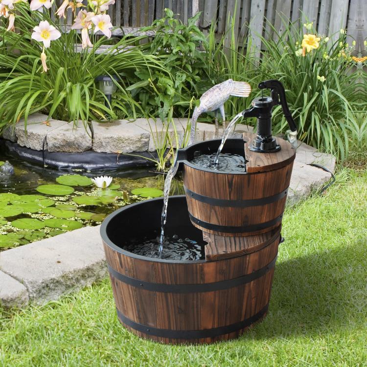 Two-tier wooden barrel fountain with black pump faucet and cascading water