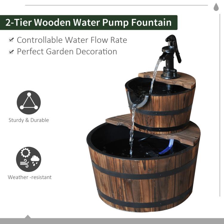 Two-tier wooden water pump fountain with black faucet and flowing water from top barrel
