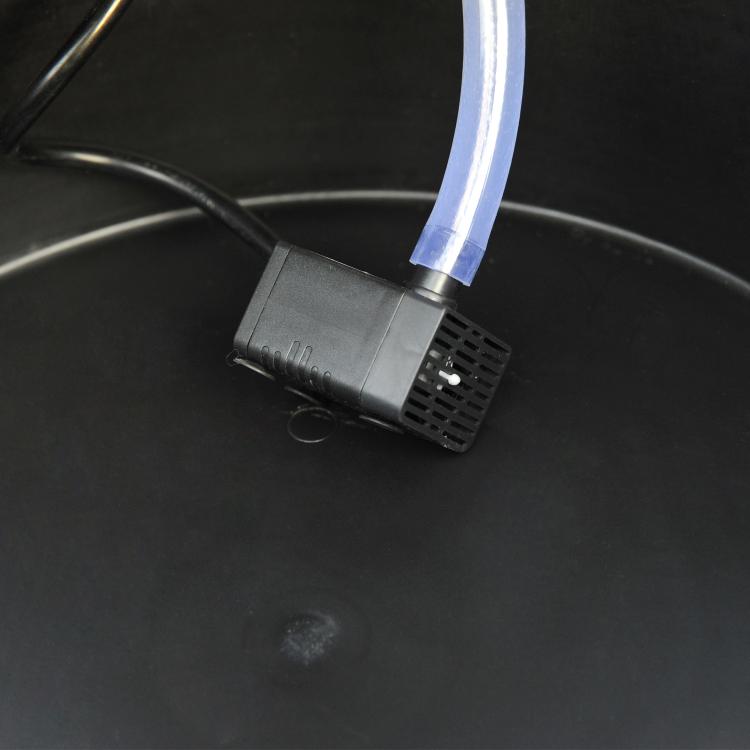 Submersible pump for barrel fountain with inlet tube and flowing water