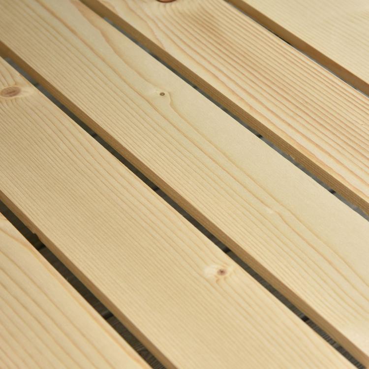 Natural wooden raised garden bed plank frame, side boards close-up