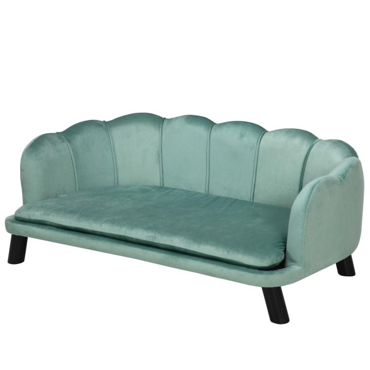 Green pet sofa bed with tufted back, cushioned seat, and short dark wood legs