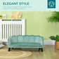 Green upholstered pet sofa bed with tufted back and padded seat, rounded arms