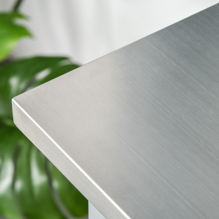 Brushed stainless steel countertop on light gray kitchen island cart