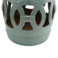 Ceramic garden stool in antique blue with circular cutout ring pattern and hollow top