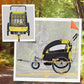 Yellow and black bike trailer side profile with orange safety flag
