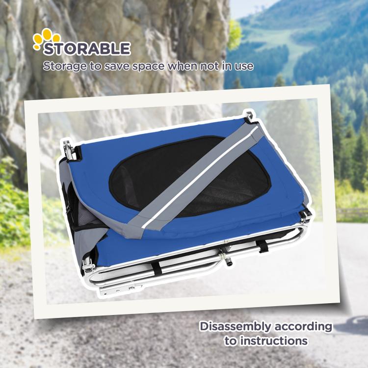 Blue dog bike trailer folded for storage, with black mesh side panels and base frame