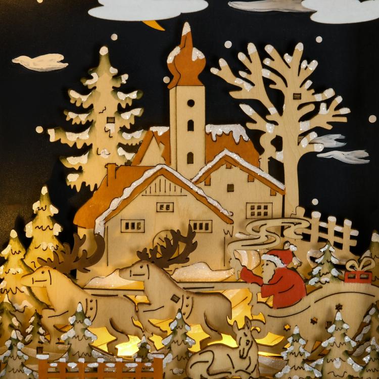 Wooden Christmas advent calendar with village scene and 24 numbered drawers, lit