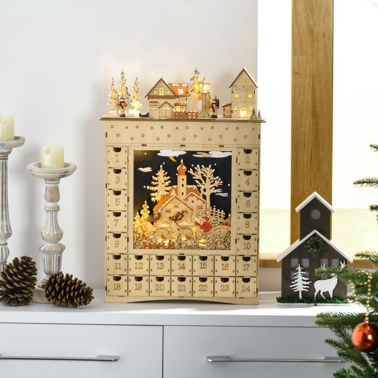 Wooden Christmas advent calendar on a tabletop with warm-lit window and 24 numbered drawers