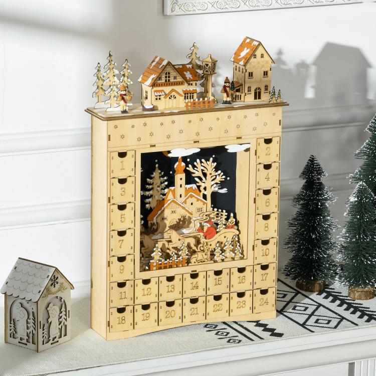 Wooden Christmas advent calendar with lit village scene window and snowy trees decor