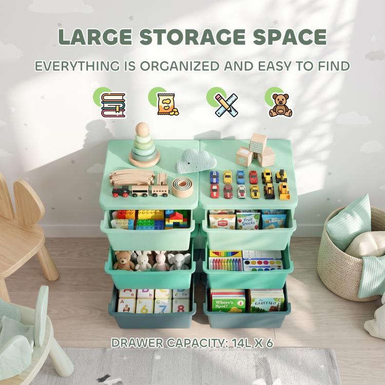 Kids storage organizer with open green drawers holding toys and books