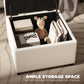 Beige storage ottoman bench with flip-top lid open, showing interior storage compartment