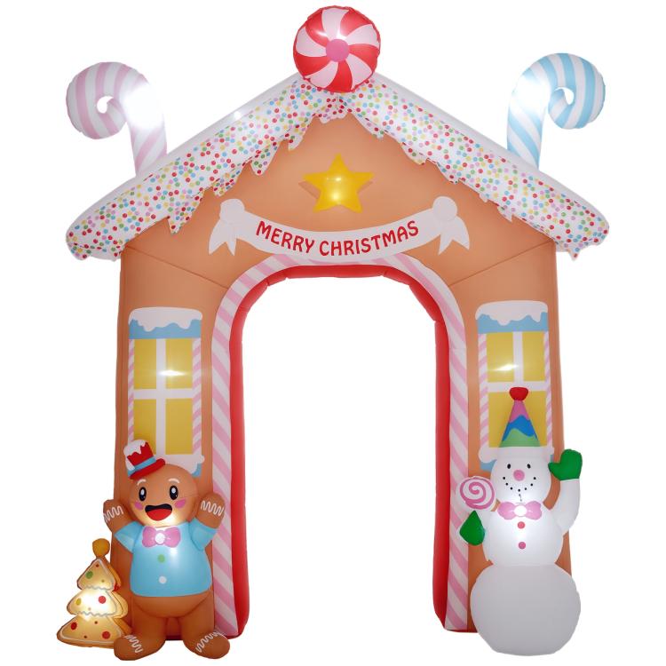 Candy house inflatable archway with red/white candy accents and smiling gingerbread character