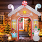 Lit candy house inflatable archway with gingerbread and snowman decorations on both sides