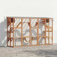 Wooden multi-cat playground enclosure with mesh walls, platforms, and a large front door