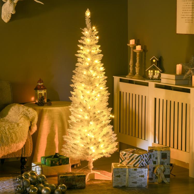 Slim white artificial Christmas tree with warm white LED lights on full branches
