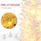 Pre-lit white artificial Christmas tree branches with warm white LED lights, close-up