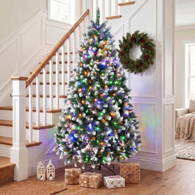Pre-lit artificial Christmas tree with multicolor lights, full hinged design