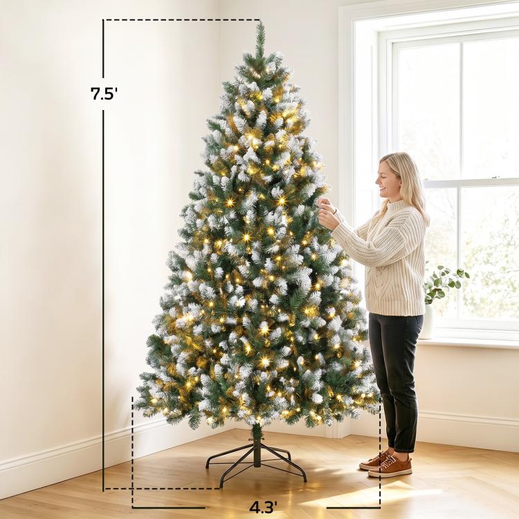 7.5 ft artificial Christmas tree with dense snowy branches and warm white pre-lit LEDs