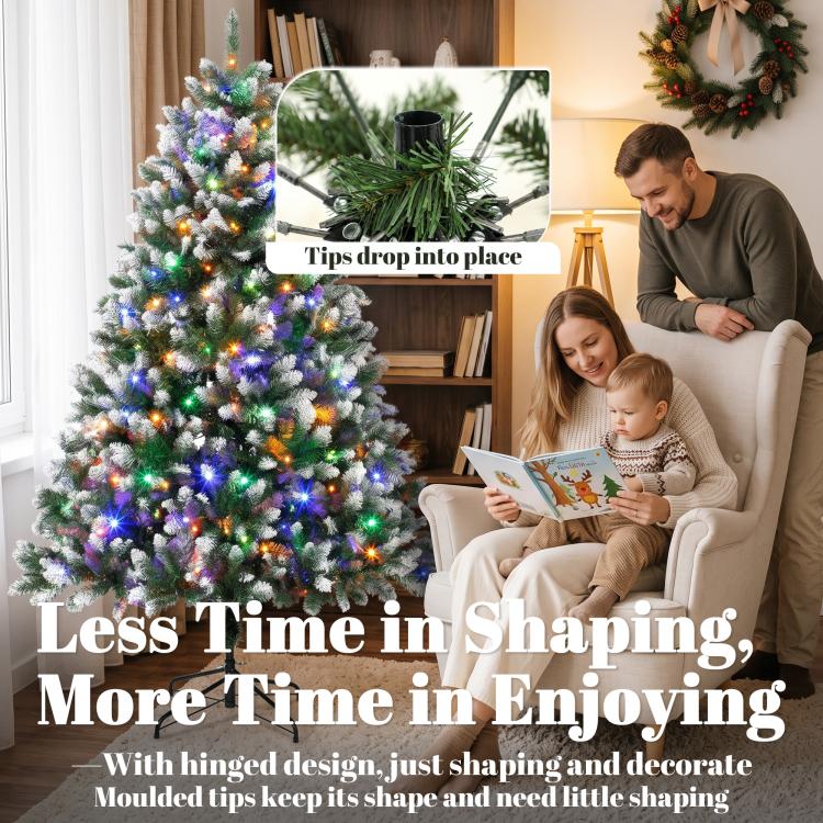 Hinged artificial Christmas tree with snowy tips and multicolor pre-lit LED lights