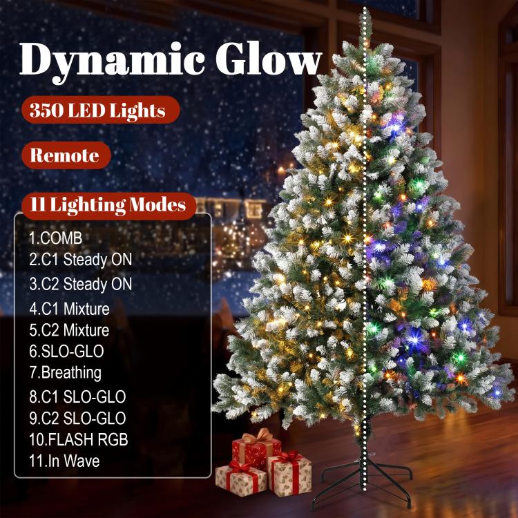 Frosted artificial Christmas tree with multicolor LED lights with lit branches