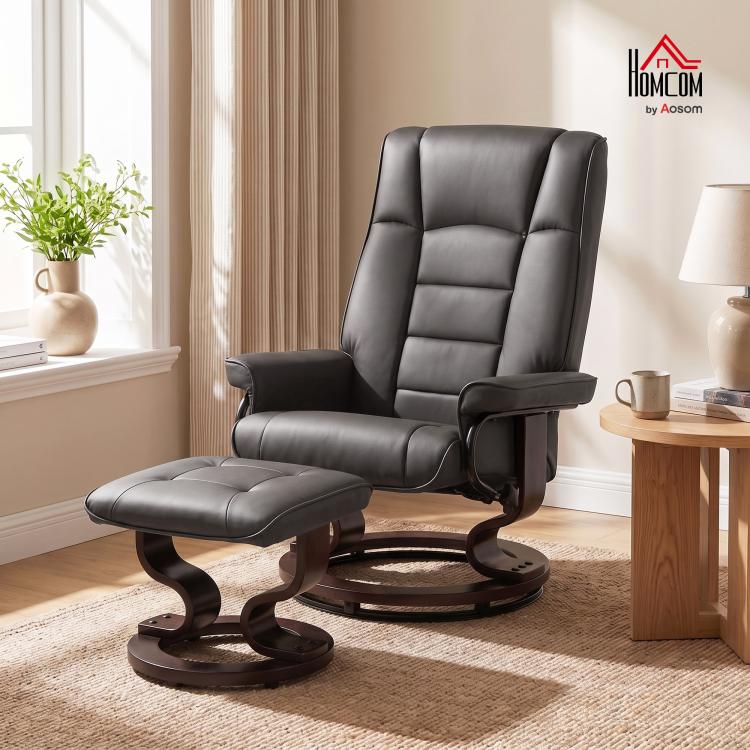 Dark gray reclining swivel chair with cushioned ottoman, wide padded backrest