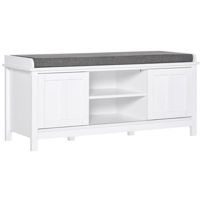 White shoe storage bench with gray upholstered top and open center shelf