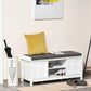 White shoe storage bench with gray cushioned seat and open compartments for shoes