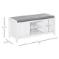 White shoe storage bench with gray upholstered top and sliding door storage