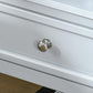 Light gray drawer front with round chrome metal knob