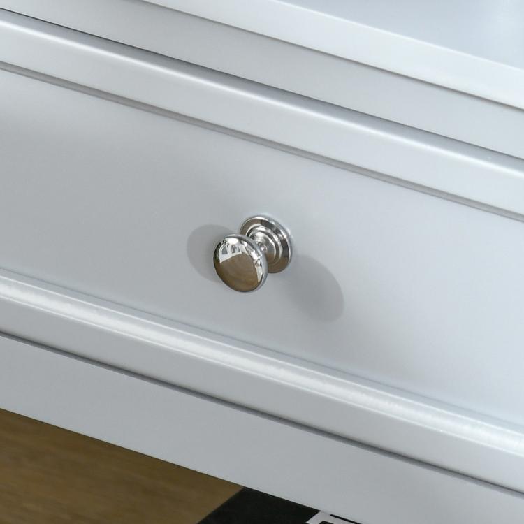 Light gray drawer front with round chrome metal knob