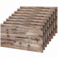 Stack of gray faux wood wall panels with 3D plank grain texture.