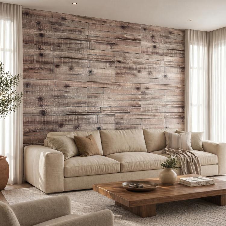 Gray faux wood plank wall paneling behind a sofa and coffee table.