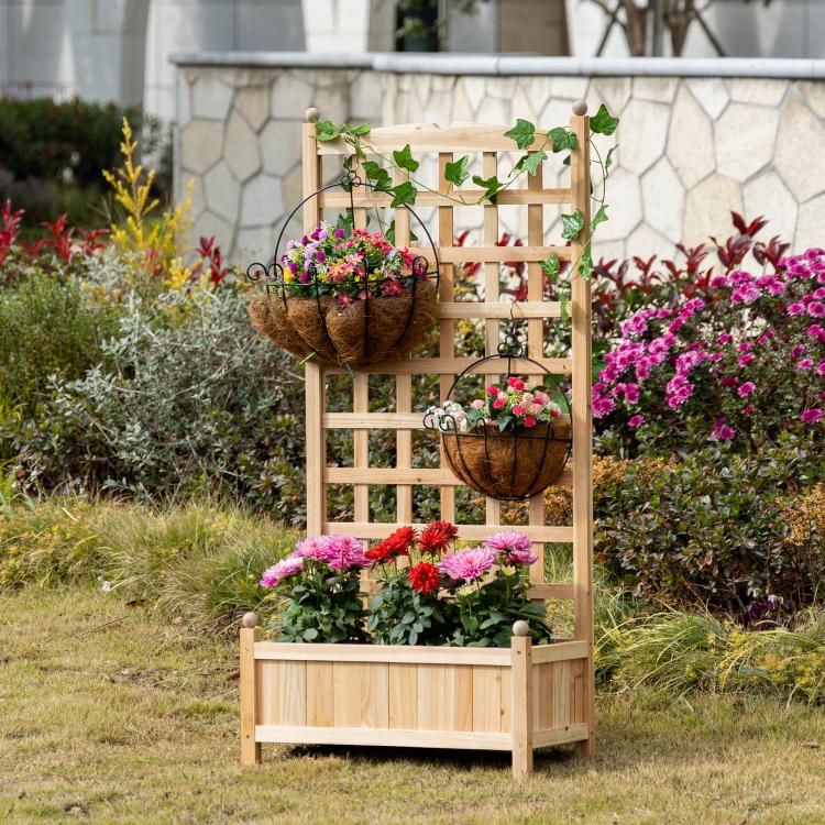 Wooden raised garden bed with trellis, filled base planter and two hanging flower baskets