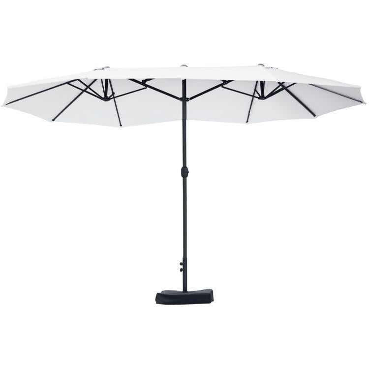 Beige patio umbrella with open canopy, central dark pole, and round weighted base