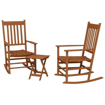 Two brown wooden rocking chairs with slatted seats and backs, plus a small side table
