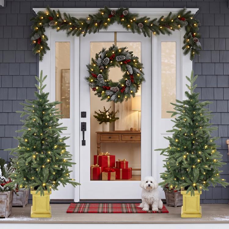 Prelit 4ft Christmas tree set of 2 with dual-color lights, standing in yellow planters