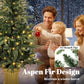 Family with a prelit Christmas tree featuring warm glowing lights and green needles.