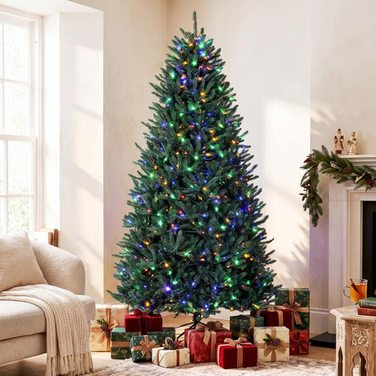 Tall artificial Christmas tree with green needles and multicolored light strands