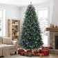 Tall artificial Christmas tree with green needles and multicolored lights