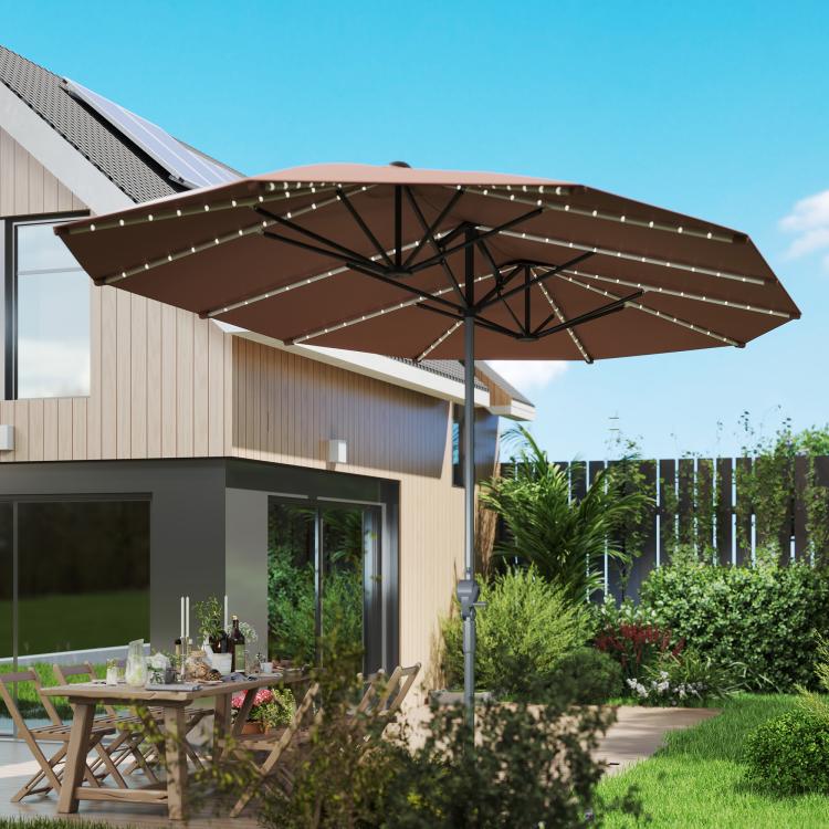 Tan patio umbrella with solar lights, open canopy and straight center pole