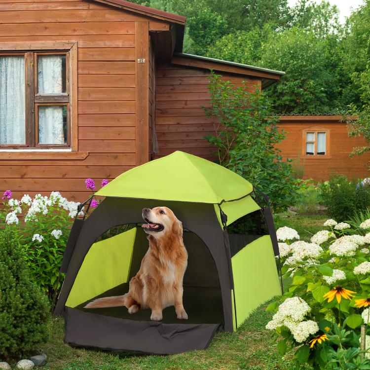 Outdoor green and black pet tent with mesh side panel and raised fabric floor